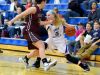Fort Defiance's Emily Humphries changes directions with the ball while guarded by Stuarts Draft's Abby Rodgers during a basketball game played in Fort Defiance on Friday, Dec. 11, 2015.