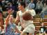 SPASH's Trev Anderson looks to pass after driving the baseline against Eau Claire North last season.
