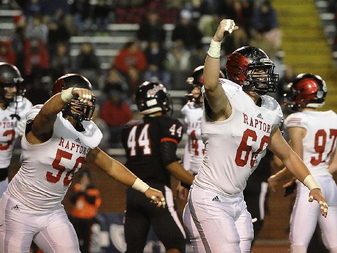 Ravenwood's Conner Dodson (50) and Patrick Leitten (60) cheers after an extra point in the second quarter of the Class 6A Championship Game (Photo: Larry McCormack, The Tennessean)
