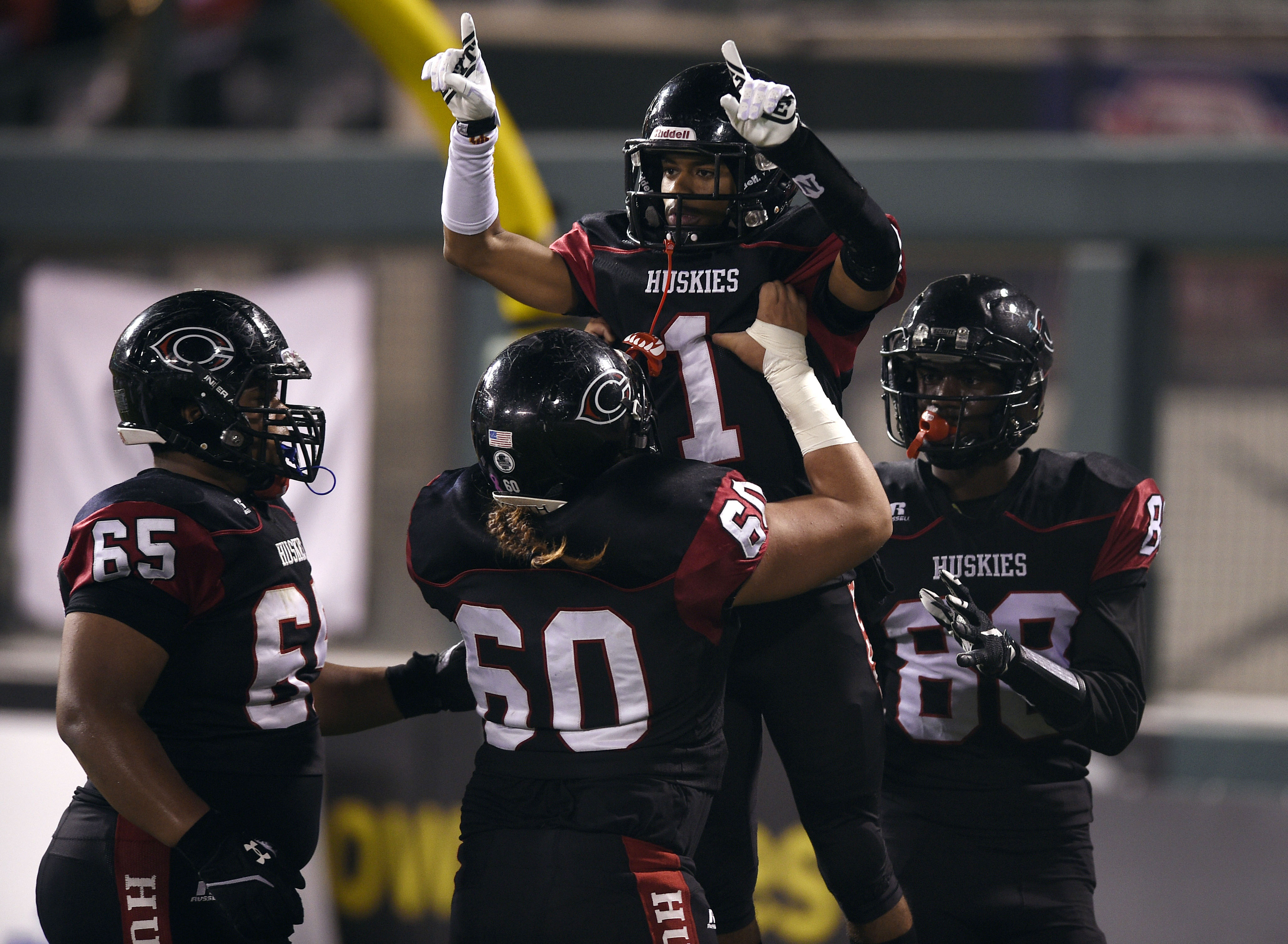 Centennial (Corona, Calif.) wide receiver Cameron Jackson (1) celebrates with teammates after scoring against St. John Bosco. Centennial plays its 15th game of the season against De La Salle (Concord) this weekend . (Photo: Kelvin Kuo, USA TODAY Sports) 