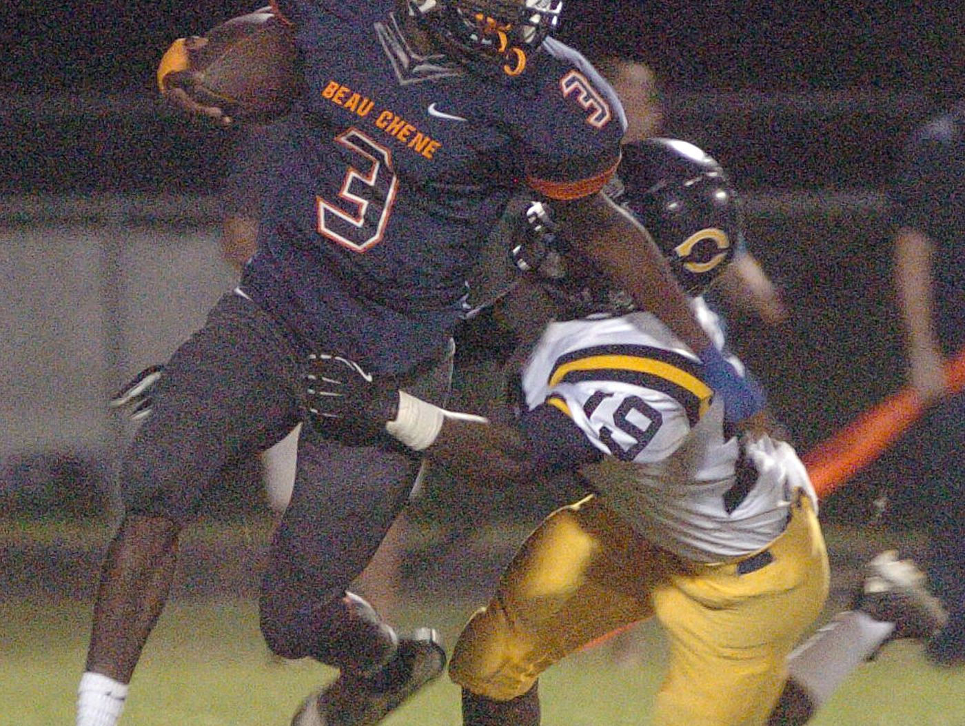 Football action Thursday between Carencro High School and Beau Chene High School.
