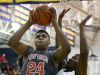 Port Huron junior Tyler Lee grabs a rebound during the Ed Peltz Holiday Basketball Tournament Friday, Dec. 18, 2015 at Port Huron Northern High School.