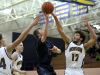 Port Huron Northern senior Kodi Badger blocks a shot by Yale senior Cody Kegley during a basketball game Tuesday, Jan. 5, 2016 at Port Huron Northern High School.