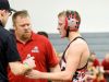 Riverheads' Garret Shultz accepts a bottle of water while talking to his coaches during a break in his match against Buffalo Gap's Josh Stagner in a 145-pound weight class during the Bison Wrestling Quad in Swoope on Wednesday, Jan. 6, 2016. Shultz won the match.