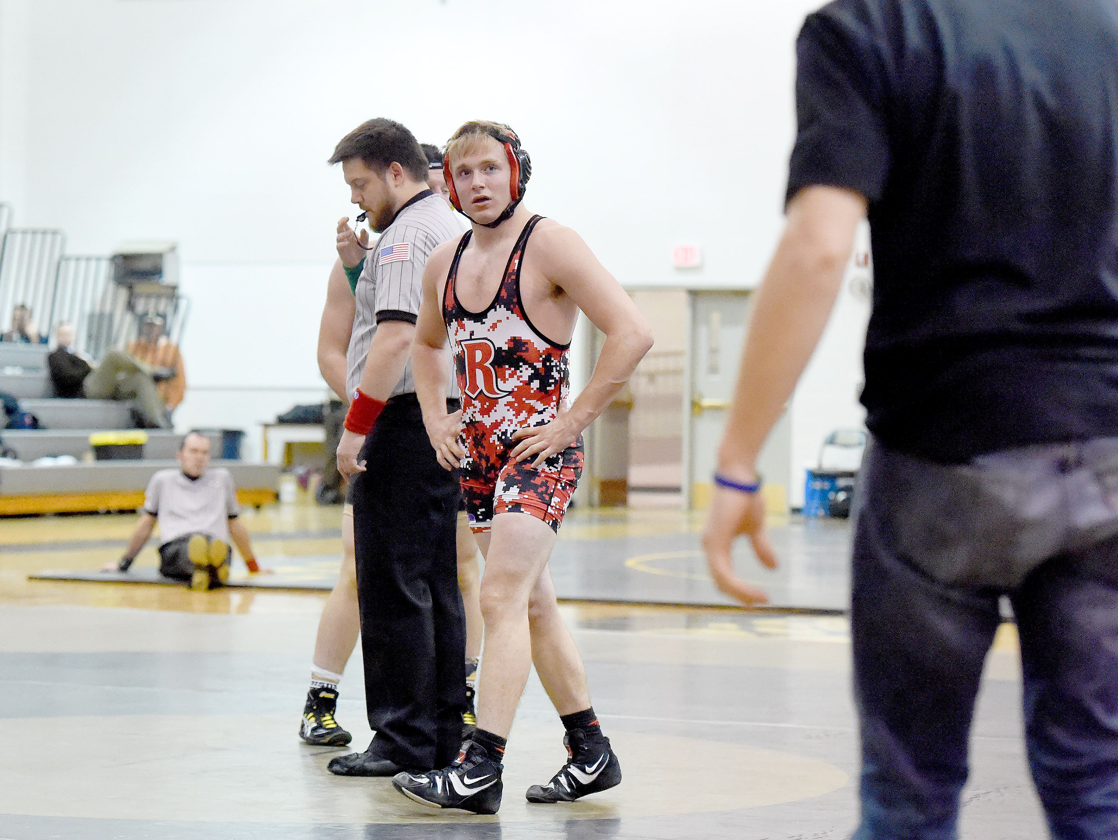 Riverheads' Garret Shultz looks to his coaches during a delay in the action in his 145-pound match against Buffalo Gap's Josh Stagner during the Bison Wrestling Quad in Swoope on Wednesday, Jan. 6, 2016. Martin won the match.