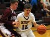 Luray's #10, Tristan Yowell defends against Stuarts Draft's #12, Jon Paul Rader as he drives towards the basket in the first quarter of their home boys basketball game Monday, Jan. 11, 2016.