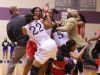 Players from Ben Davis and Pike fight in the fourth quarter of the game as fans and players spilled on to the court. (Photo: Indianapolis Star) 