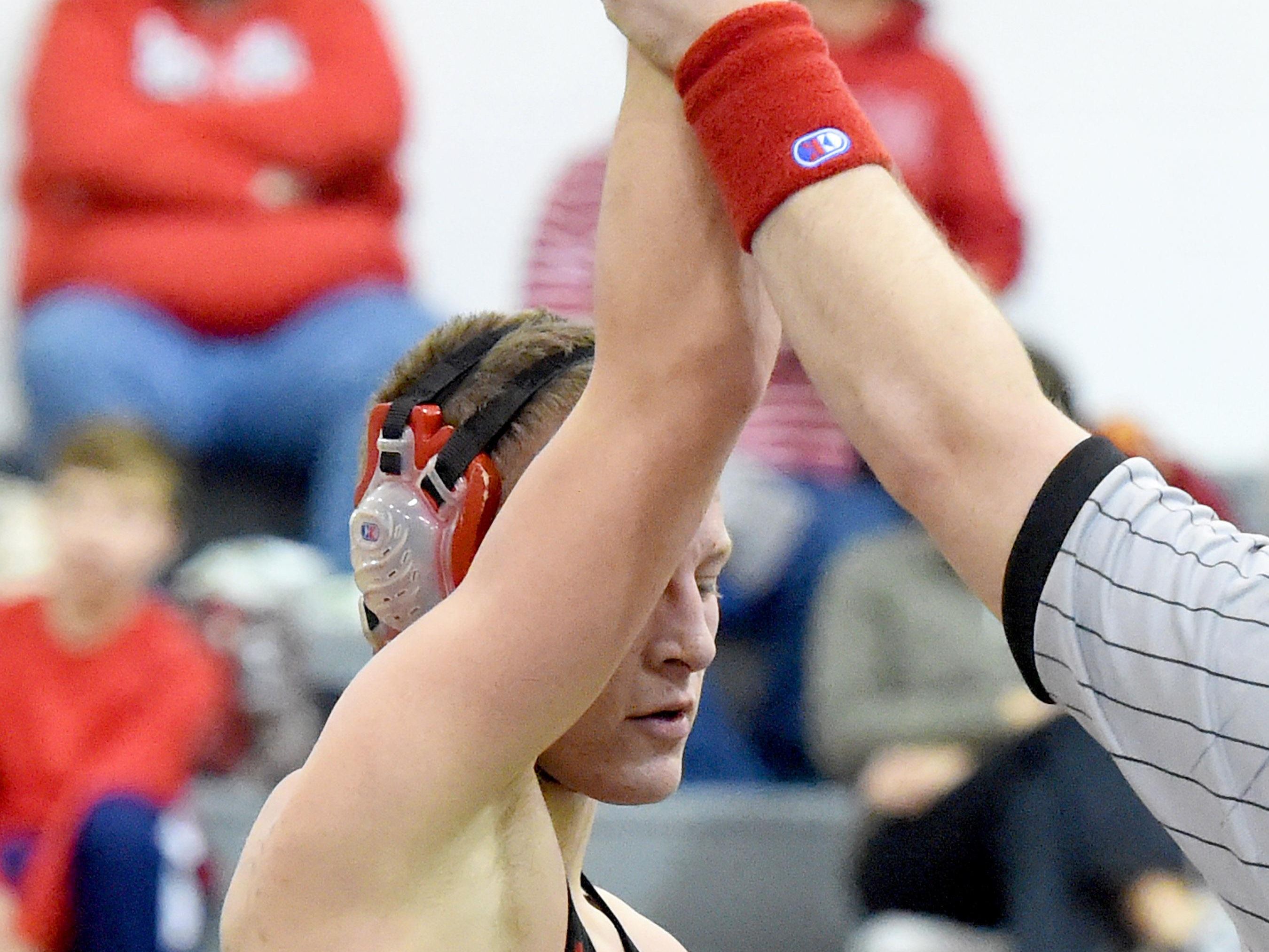 Riverheads’ Garret Shultz has his armed raised after he wins his 145-pound match against Buffalo Gap’s Josh Stagner during the Bison Wrestling Quad in Swoope on Wednesday.