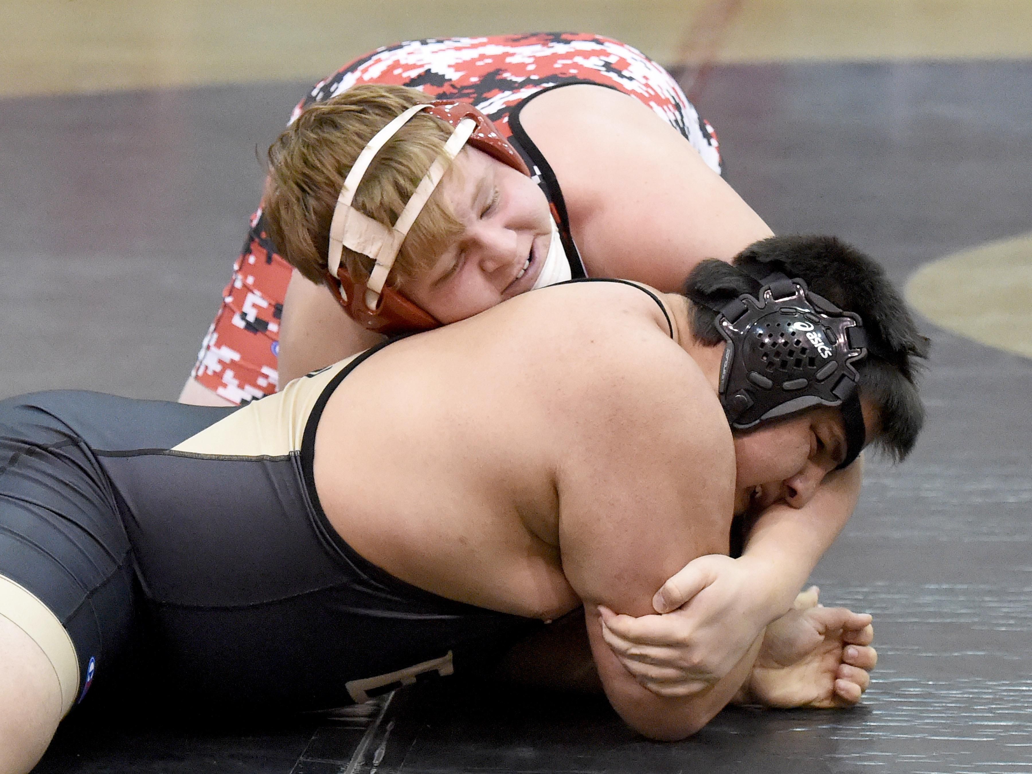 Riverheads' James Rea (top) wrestles Buffalo Gap's Wesley Tinsley in a 285-pound weight class. Rea won the match with a pin.