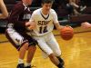 Luray's #10, Tristan Yowell defends against Stuarts Draft's #12, Jon Paul Rader as he drives towards the basket in the first quarter of their home boys basketball game Monday, Jan. 11, 2016.