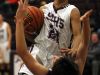 Stuarts Draft's #22, Antonio Ruiz Haynes drives to the basket against Luray's #00, Trea Atkins. Ruiz Hanes was called for a charge on the play in the second quarter at Stuart Draft High School during their boys basketball game Monday, Jan. 11, 2016
