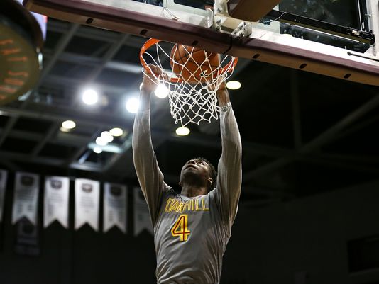 Oak Hill Academy forward Mario Kegler (4) dunks during first quarter action of the 2016 Tournament of Champions first round. (Photo: Guillermo Hernandez Martinez, News-Leader)