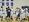 Teammates and opponents surround Walker Fruits (center0 after scoring in a seventh-grade basketball game. (Photo: Courtesy of Brownsburg East Middle School)
