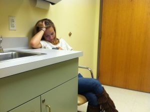 A female athlete waits to see a neurologist after sustaining a concussion (Photo: USA TODAY High School Sports)