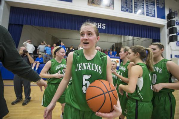 Jenkins guard Whitney Creech reacts after she scored 71 pounts against Paintsville in overtime to become the all-time scorer in Kentucky at 4, 957 on Feb. 2 (John Flavell, Special to the Courier-Journal)