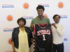 Josh Jackson with his mother and grandmother after he received his honorary McDonald's All American jersey (Photo: McDonald's All American Game)