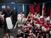 Port Huron coach Ben Pionk talks with players in the locker room during a hockey game Tuesday, March 3, 2015 at McMorran Pavilion.