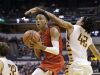 New Albany Bulldogs Romeo Langford (1) drives by McCutcheon Mavericks Billy Loft (42) in the second half of the IHSAA 4A Boys Basketball State Final game Saturday, Mar 26, 2016, evening at Bankers Life Fieldhouse. The New Albany Bulldogs defeated the McCutcheon Mavericks 62-59.