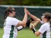 Wilson Memorial pitcher Jordan Sondrol claps hands with teammate Emma Peery before taking the pitchers mound at the start of the first inning during a softball game played in Fishersville on Friday, April 1, 2016.
