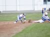 Richmond's Stefan Fenwick (right) slides into second base while Marysville's Austin Paterson applies the tag on April 13, 2016 at Richmond High School.