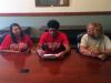 The Miller School's Chance Sheffey, middle, signs his scholarship offer to U.Va.-Wise on Friday. His mom, Trina Sheffey, left, and grandmother Rebecca Johnson joined him at the signing.