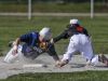 Marine City's Jake Hassein tags out Richmond's Trevor Barrett at second during a baseball game Friday, April 15, 2016 at Marine City High School.
