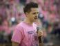 Michael Groulx, of Marysville, speaks to the crowd about his family's experience with cancer as part of the Pink Out during half time of a basketball game Friday, Feb. 5, 2016 at Marysville High School.