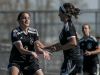 Marine City freshman Jenna Waelens, left, claps hands with freshman Lydia Fowler after she scored a goal during a soccer game Wednesday, May 18, 2016 at Marysville High School.