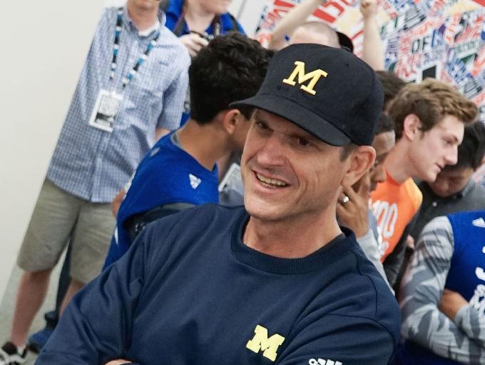 Jim Harbaugh dons Andrew Luck jersey at first satellite camp, urges  students to have 'winning day'