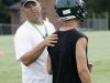 Wilson Memorial High School football coach Jeremiah Major runs drills during the first day of practice on Thursday, July 28, 2016.