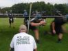 Wilson Memorial High School football coach Jeremiah Major runs lineman drills during the first day of practice on Thursday, July 28, 2016.