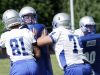Robert E. Lee High School linemen run drills during the first day of football practice on Thursday, July 28, 2016.