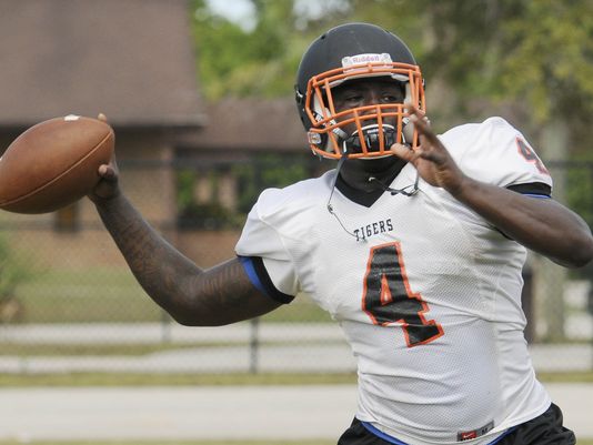Cocoa High School QB Bruce Judson throws to an open receiver during practice Tuesday afternoon. (Photo: Craig Bailey/FLORIDA TODAY)