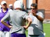 Waynesboro head coach Derek McDaniel addresses his players during varsity football practice at the school on Friday, Aug. 12, 2016.