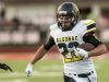 Algonac's Brandon Spencer drives the ball down field during a football game Thursday, August 25, 2016 at East China Stadium.