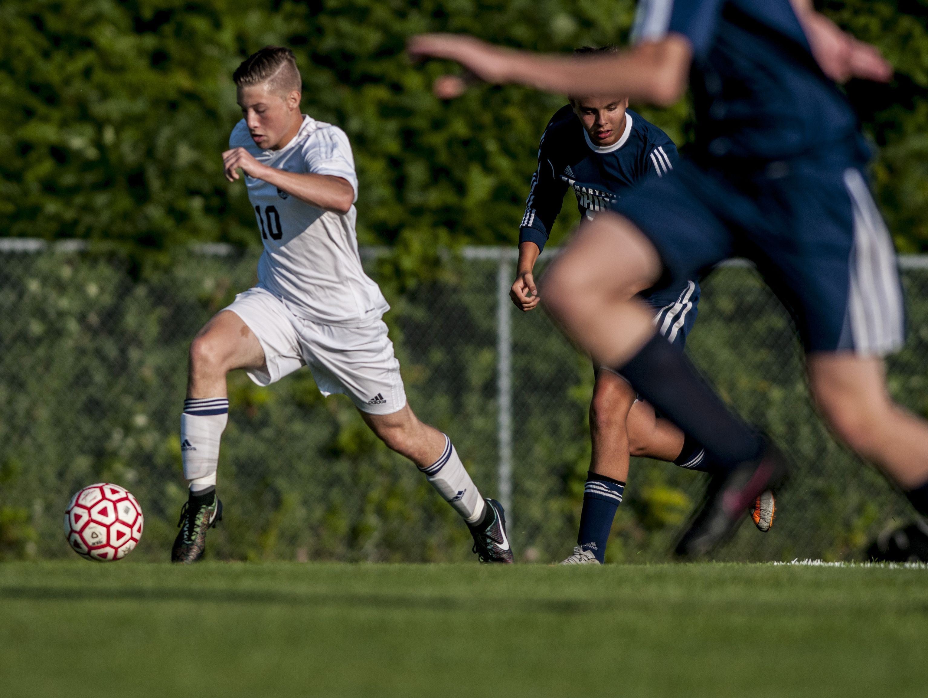 Port Huron's Marko Nedeljkovic breaks away with the ball during a soccer game Wednesday, August 31, 2016 at Port Huron Northern High School.