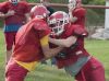 Peck's Caleb Potter, right, and Randy Abrego try to push one another out of a circular area Wednesday, Aug. 17 during their football practice at Peck High School.