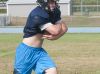 Yale's Hunter Trombley (SP?) runs the ball up the middle Thursday, Aug. 11, 2016 during their football practice at Yale High School.