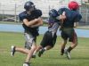Yale's Andrew Phillips runs the ball Thursday, Aug. 11, 2016 during their football practice at Yale High School.