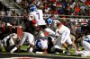 Aug 27, 2016; Cedar Hill, TX, USA; Bishop Gorman Gaels running back Baggio Ali Walsh (7) runs for a touchdown in the second quarter against Cedar Hill Longhorns linebacker Caleb Scott (31) in the second quarter at Longhorn Stadium in Cedar Hill. Mandatory Credit: Tim Heitman-USA TODAY Sports ORG XMIT: USATSI-326116 ORIG FILE ID: 20160827_ajw_sh2_339.jpg