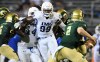 Aug 27, 2016; Loganville, GA, USA; IMG Academy defender Josh Kaindoh (99) rushes the passer against the Grayson Rams during the second half in a high school football duel of top ranked teams at Grayson Community Stadium. IMG Academy defeated the Grayson Rams 26-7. Mandatory Credit: Dale Zanine-USA TODAY Sports ORIG FILE ID: 20160827_sal_sz2_198.JPG