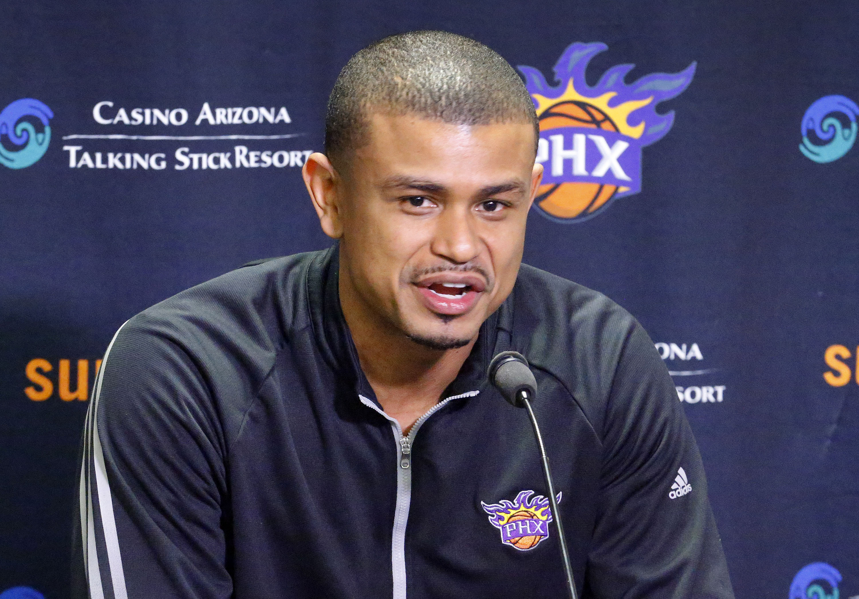 Suns coach Earl Watson has suit game but would be for sweats, sneakers