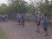 After Southwest Christian School cross country runners cross the finish line, they take a moment to recover, and then go encourage every other runner who hasn't yet finished. (Photo: WFAA)