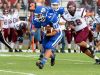 Fort Defiance's Austin Fitzwater runs the ball as Stuarts Draft's John Gumann pursues during a football game played in Fort Defiance on Friday, Sept. 2, 2016.