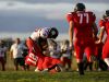 Kennedy senior Brett Traeger (12) tackles Clatskanie freshman James Helman (25) in the season-opening game on Friday, Sept. 2, 2016, in Mt. Angel, Ore. The Kennedy Trojans defeated the Clatskanie Tigers 52 to 13.
