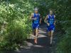 CrosLex's Jarred Jolley and Max Whittredge lead the Division 2-3-4 race as they exit the wood loop Saturday, Sept. 10 at the Algonac Muskrat Cross Country Classic at Algonac High School.