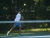 Huskies' John Betrus hits the ball Monday, Sept. 12, during boys tennis action at Sanborn Park tennis courts.