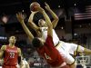 Kickapoo's Cameron Davis, top center, is fouled on his way to the basket by Chaminade's Jericole Hellems (4) as Chaminade's Jayson Tatum (22) watches during the second half of the 2016 Missouri Class 5 boys' high school championship game in Columbia.