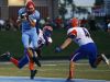 Glendale wide receiver Von Oeser (8) catches a touchdown pass between two Hillcrest defenders during the first quarter of a game at Lowe Stadium.