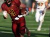 Roosevelt's Carter Carstens gains yardage against Harrisburg during their game at Howard Wood Field on Friday.